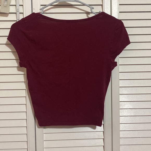 woman’s small burgundy shortsleeved shirt - Picture 2 of 4